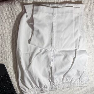 White dress slacks/elastic waist/ side pockets